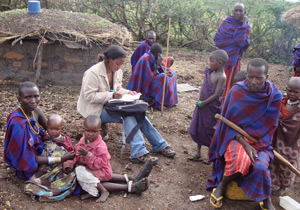 Photo: Researcher with Massai families in Tanzania