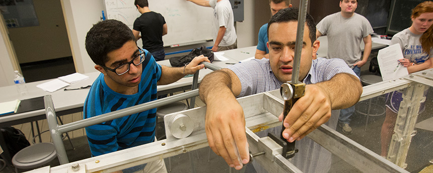UC Davis civil and environmental engineering graduate student Kaveh Zamani, right, teaches undergraduates in the hydrophonics lab in Bainer Hall. He was also a winner of the 2014 Outstanding Graduate Student Teaching Award. (Karin Higgins/UC Davis)