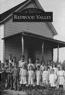 Book cover showing historic photo of school children and teachers
