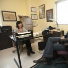 Photo: professor and student talking in faculty office
