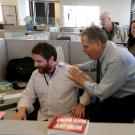 Photo: surprised staffers in news room