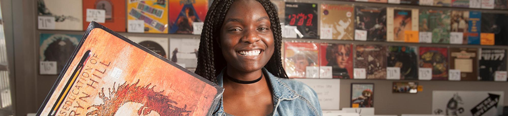 Taking a gap year after graduation can help decide your future. McNair scholar and Fulbright award winner Amanda Eke ’17, with bachelor’s degree in gender, sexuality and women's studies, is spending this year using hip hop lyrics to teach English in Malta. (Gregory Urquiaga/UC Davis)
